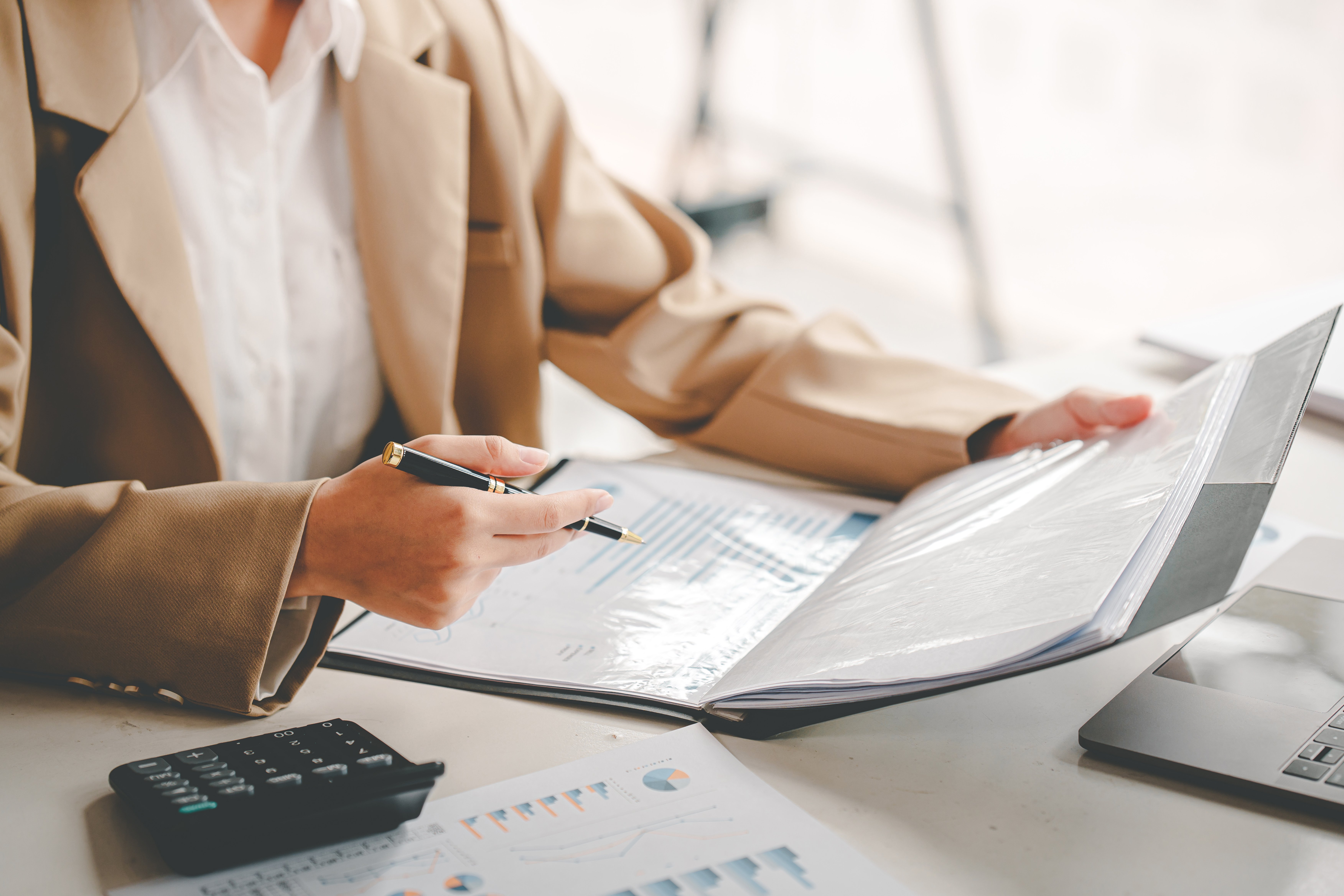 Finance professionals analysing budget reports and forecasts, demonstrating how Corporate Planner supports faster financial planning and control.